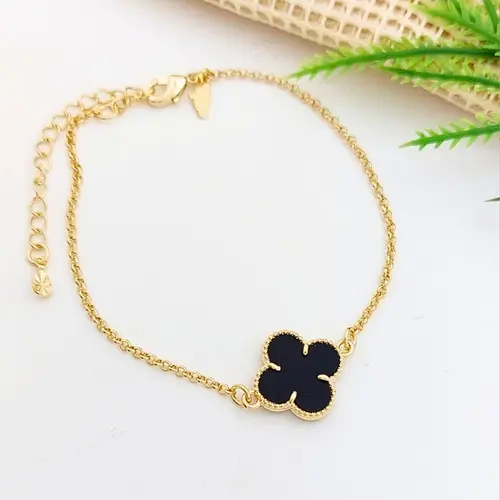 PULSEIRA TREVO PRETA BANHADA A OURO 18K