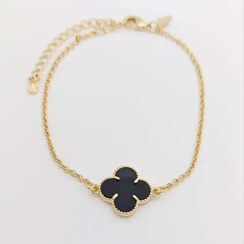 PULSEIRA TREVO PRETA BANHADA A OURO 18K