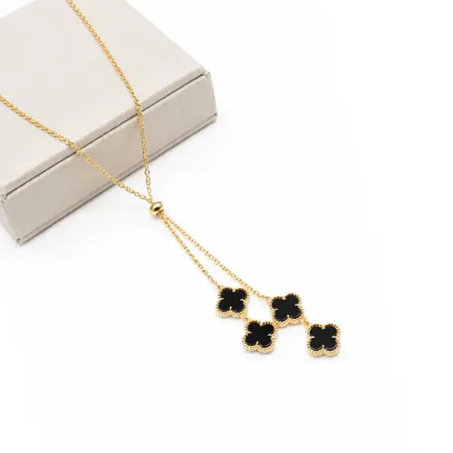 GRAVATA TREVO PRETO BANHADA A OURO 18K