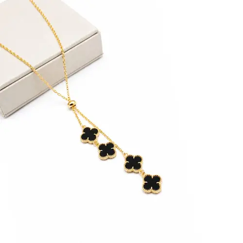 GRAVATA TREVO PRETO BANHADA A OURO 18K