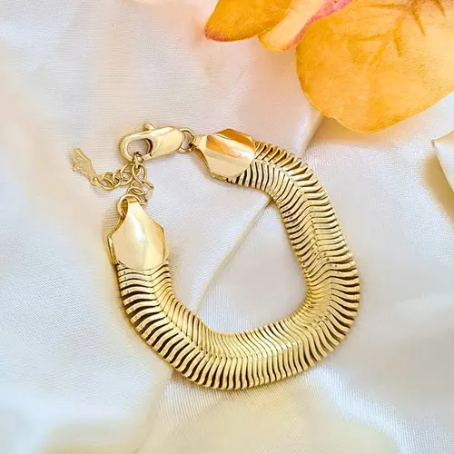 PULSEIRA MALHA GROSSA BANHADA A OURO 18K