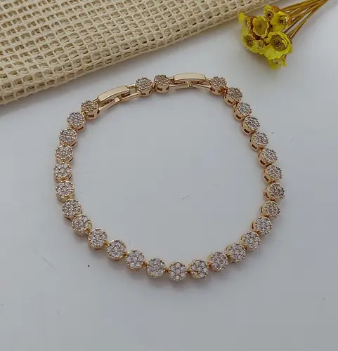 PULSEIRA RIVIERA CRAVEJADA BANHADA A OURO 18K