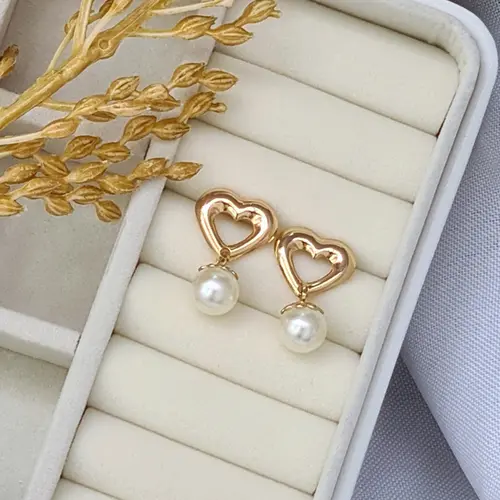 BRINCO CORAÇÃO VAZADO BANHADO A OURO 18K