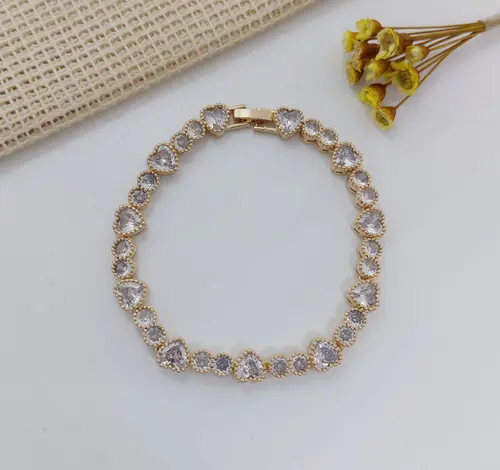 PULSEIRA CORAÇÕES DE LUZ DOURADA BANHADA A OURO 18K