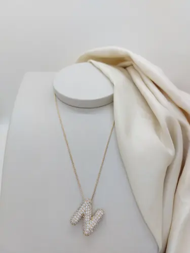 COLAR INICIAL CRAVEJADO BANHADO A OURO 18K