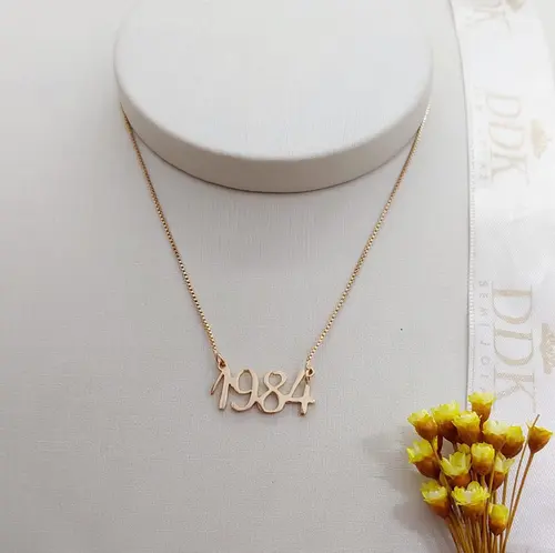 COLAR DATA DO ANO BANHADO A OURO 18K