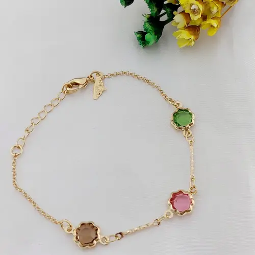 PULSEIRA INF CRISTAIS ARCO-ÍRIS BANHADA A OURO 18K