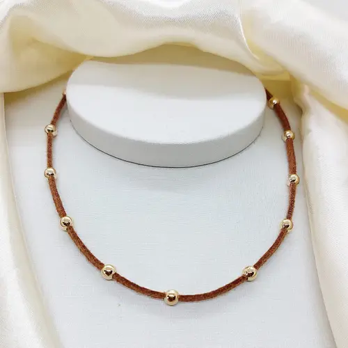 CHOKER COURINE COM BOLAS BANHADO A OURO 18K