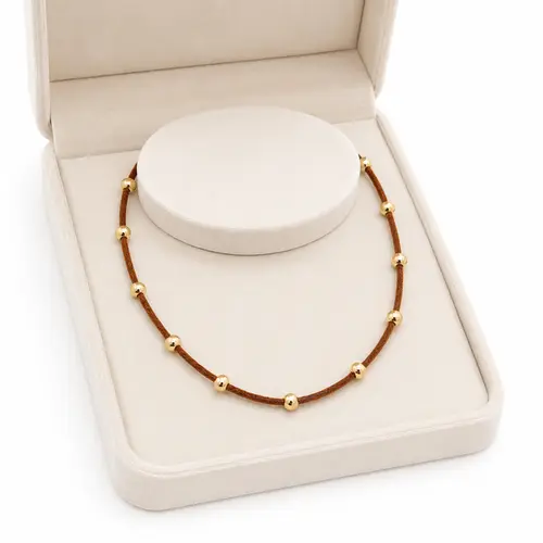 CHOKER COURINE COM BOLAS BANHADO A OURO 18K
