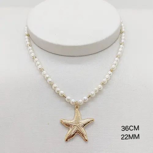 Choker estrela do mar banhado em ouro 18k.