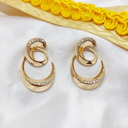 BRINCO MOLA BANHADO A OURO 18K