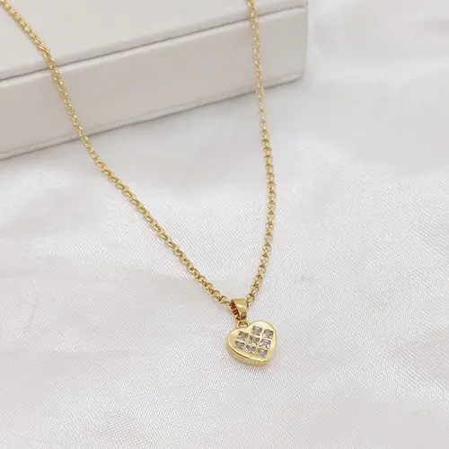 CHOKER  CORAÇÃO EM GRADE BANHADO A OURO 18K