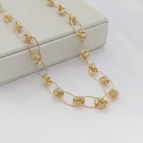 CHOKER TRANÇADA BANHADA A OURO 18K