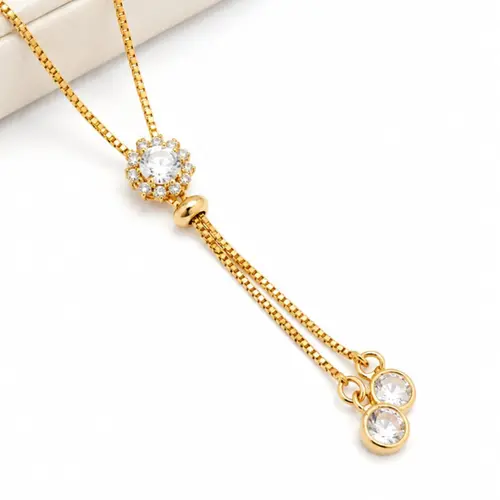 GRAVATA FLOR BANHADA A OURO 18K