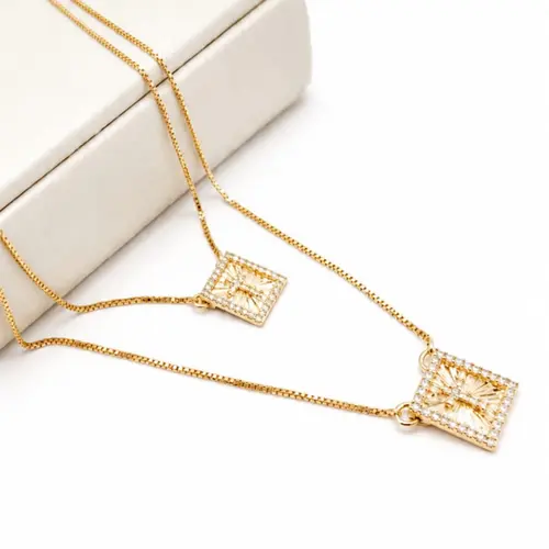 ESCAPULARIO CRAVEJADO BANHADO A OURO 18K