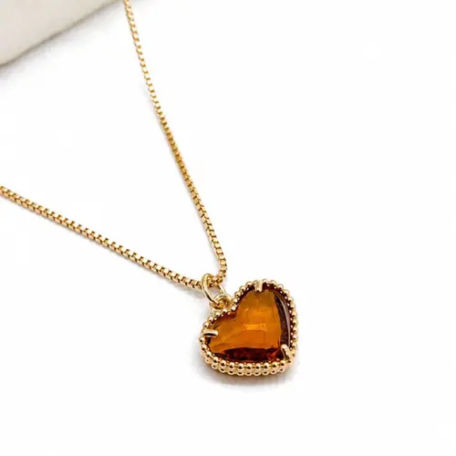 COLAR CORAÇÃO MARROM BANHADO A OURO 18K.